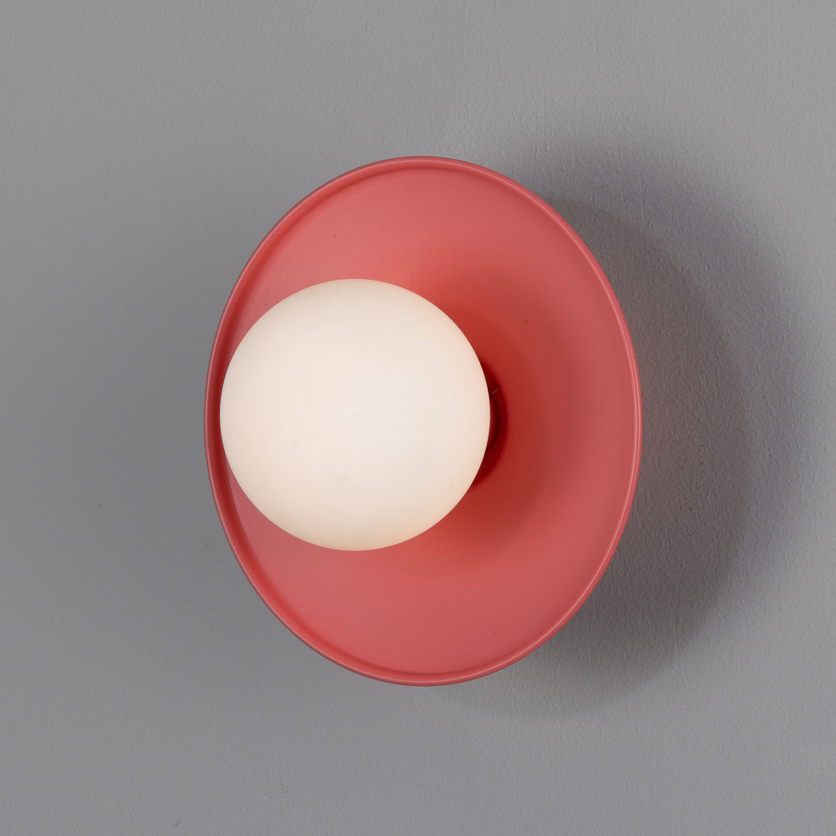 Aosta IP65 Brass Disc Bathroom Wall Light in Antique Pink with Opal Glass Globe