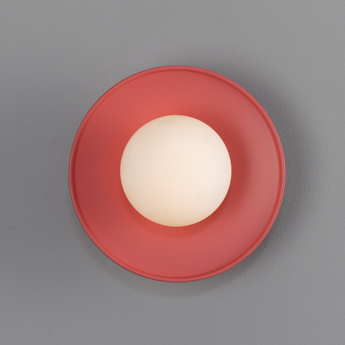 Aosta IP65 Brass Disc Bathroom Wall Light in Antique Pink with Opal Glass Globe