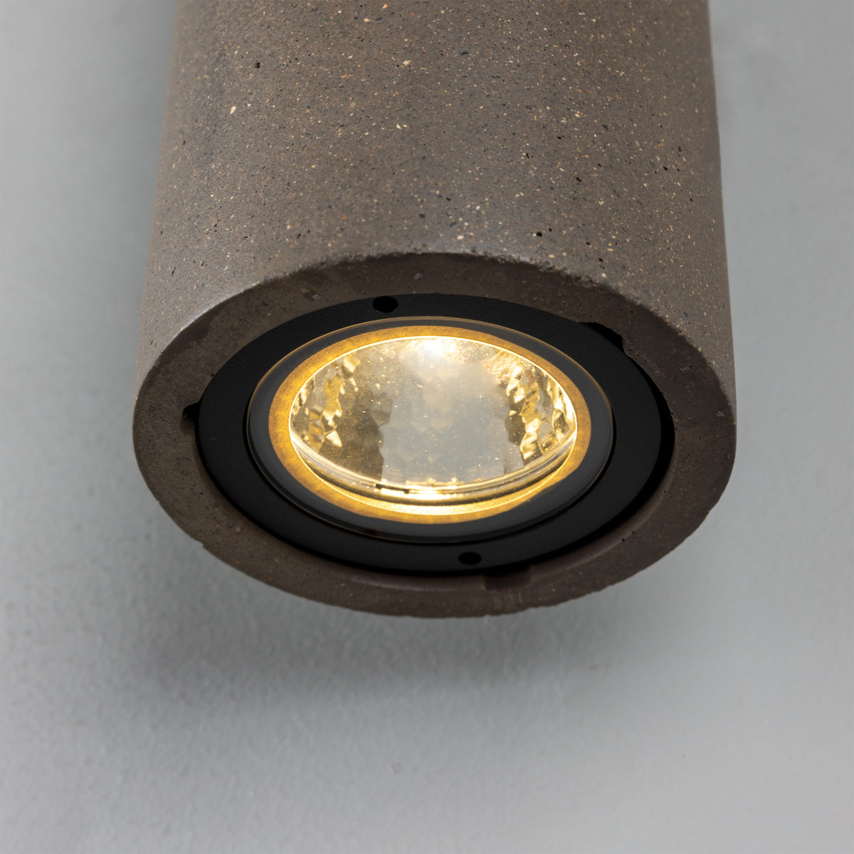 Mullan Pudong cylindrical concrete LED wall light with illuminated lens