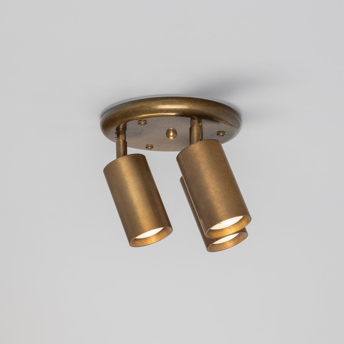 Mullan Evanston three light directional antique brass ceiling spotlight
