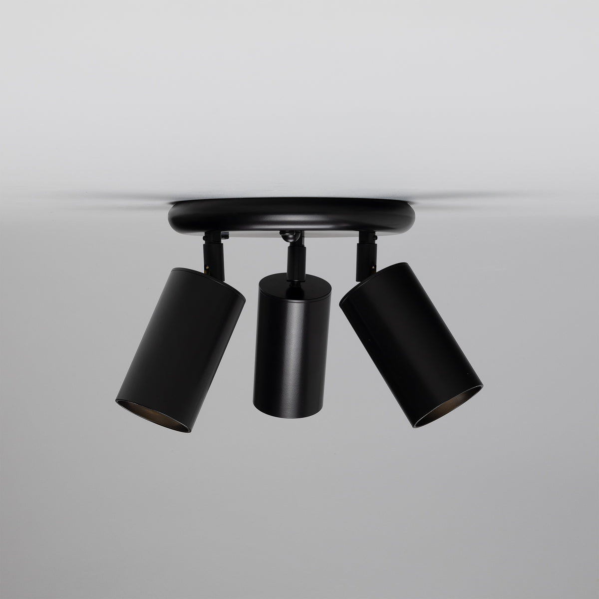 Evanston Three Light Directional Brass Ceiling Spotlight in Matte Black