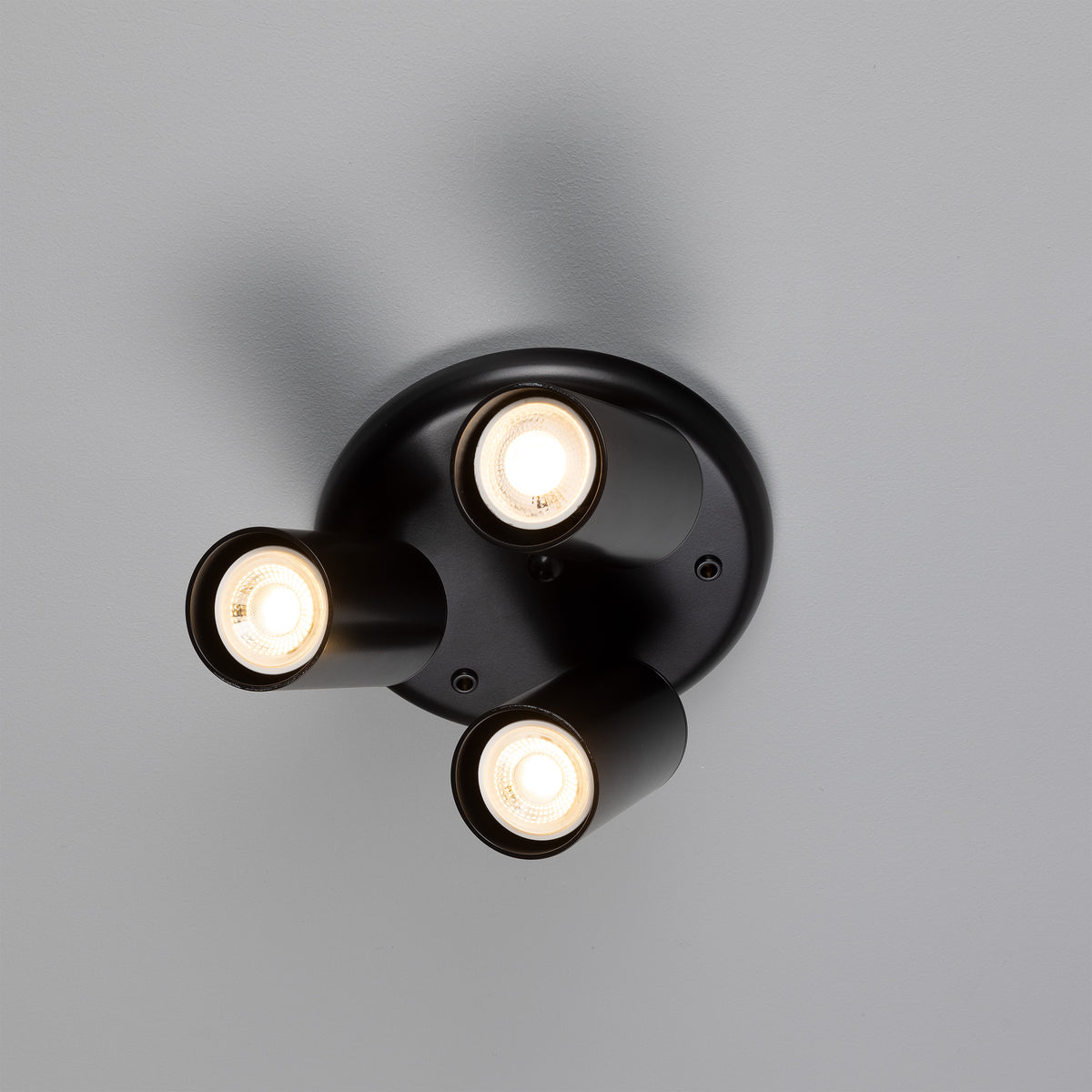 Mullan Evanston three light directional brass ceiling spotlight in matte black