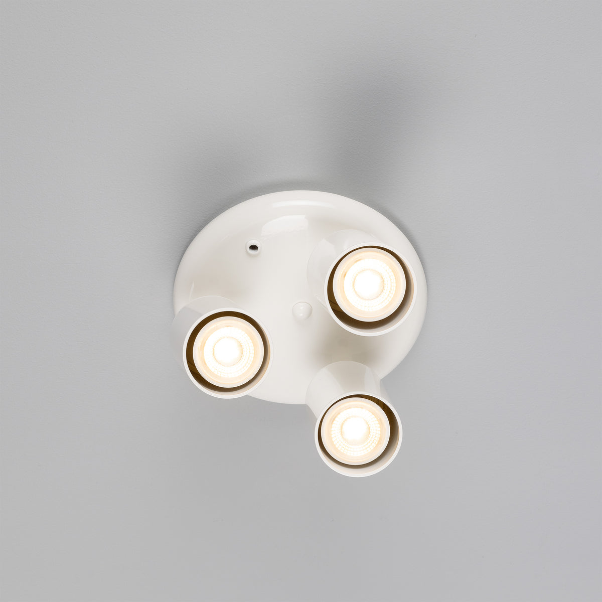Evanston Three Light Directional Brass Ceiling Spotlight in White
