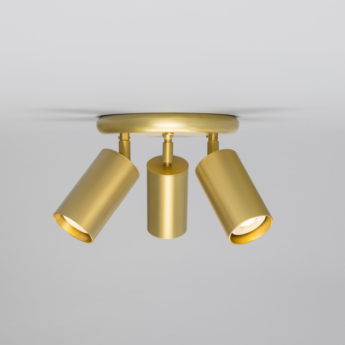 Mullan Evanston three light directional brass ceiling spotlight in satin brass