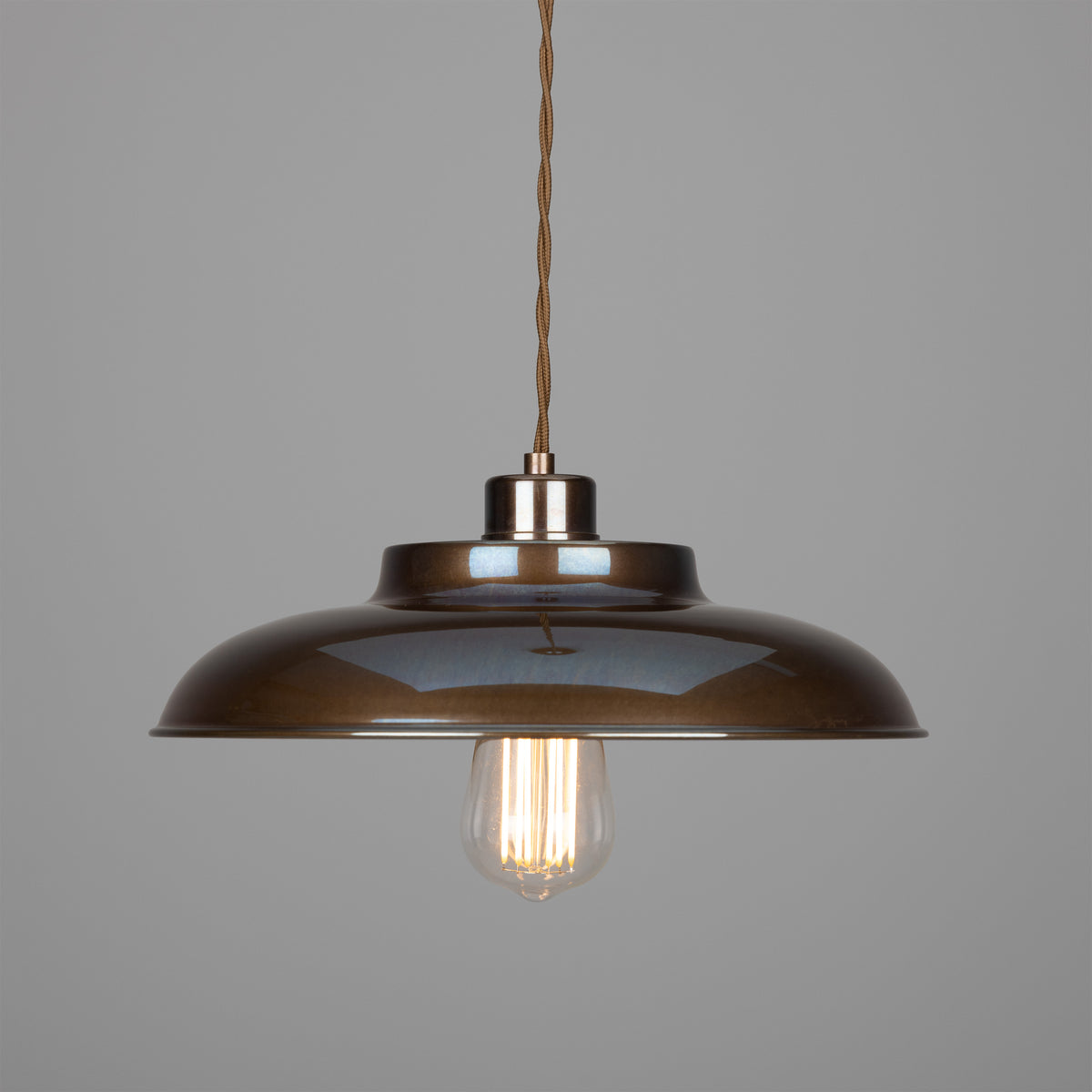 Bronze metal dome pendant light with exposed filament bulb