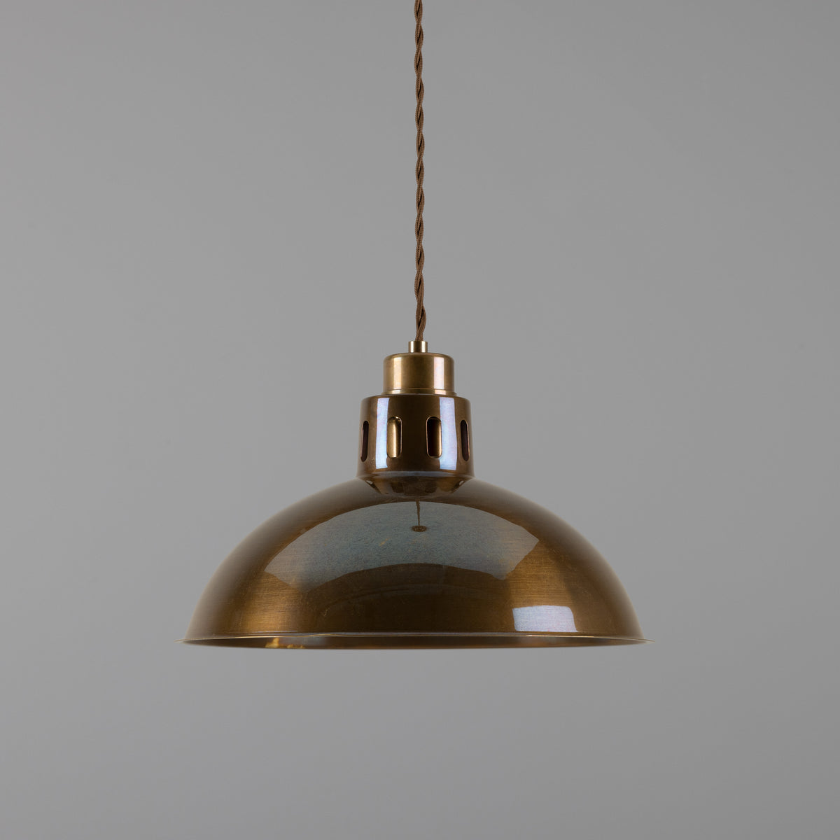 Antique brass dome pendant light with a braided cord