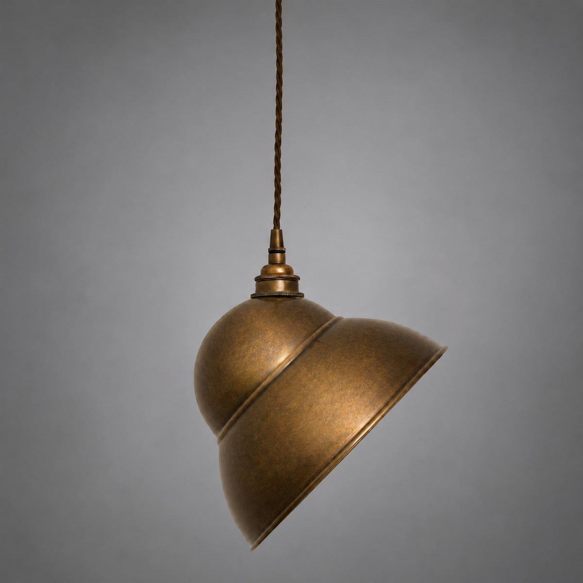 Mullan La Paz pendant light in antique brass with a dome shade and braided cord