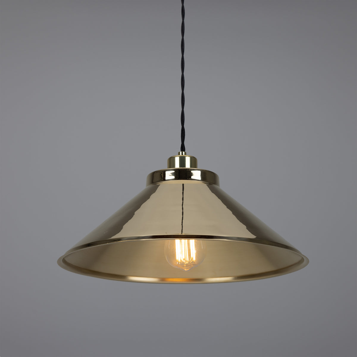 Mullan Rio E27 vintage pendant light in polished brass with a conical shade and exposed filament bulb