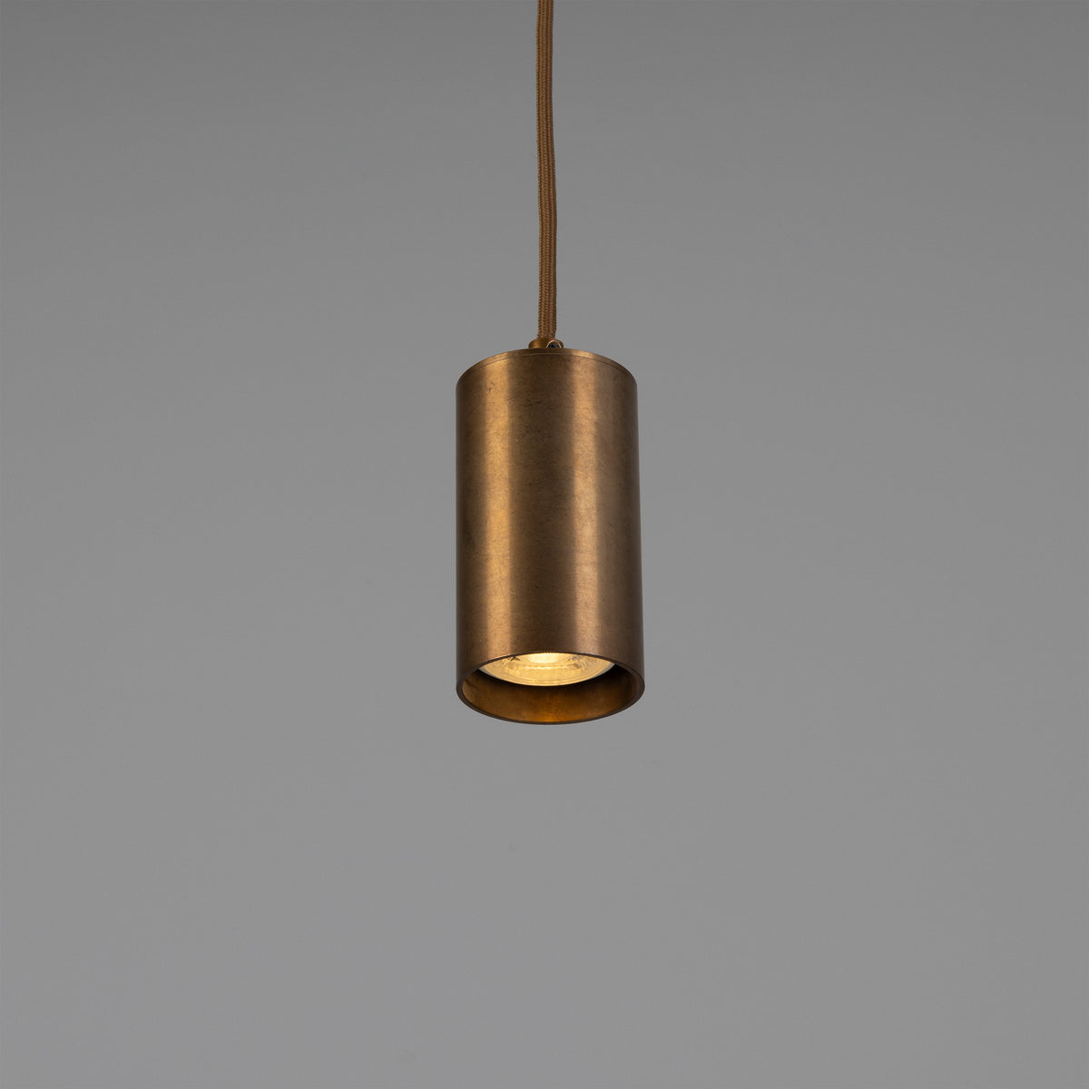 Evanston Single Drop Brass Pendant Spotlight in Antique Brass