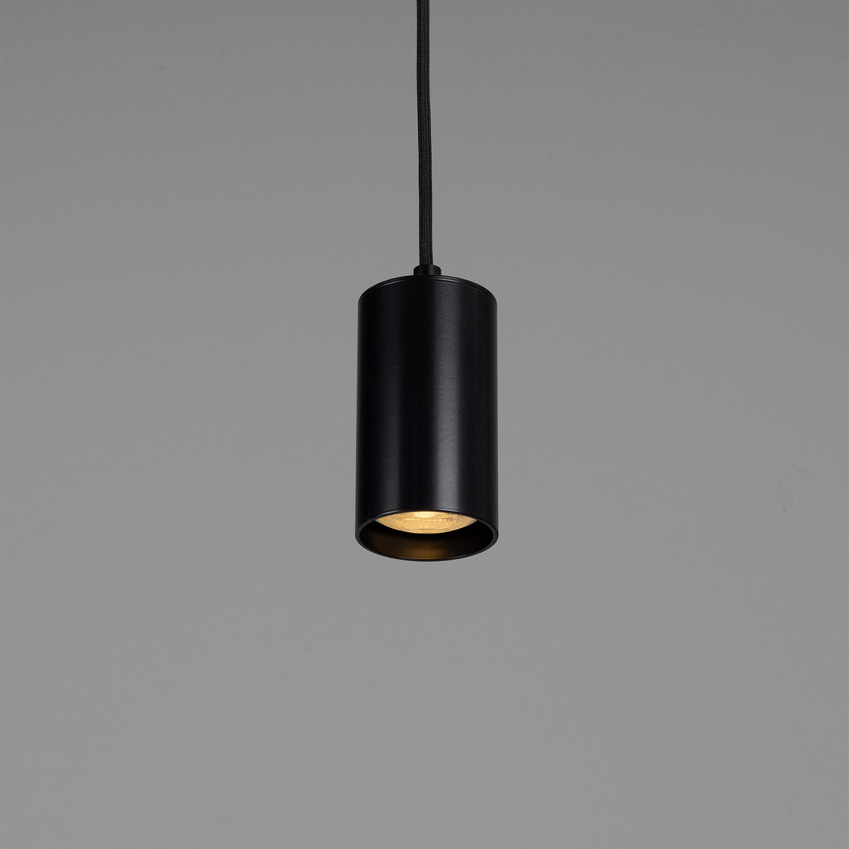 Evanston Single Drop Brass Pendant Spotlight in Matte Black