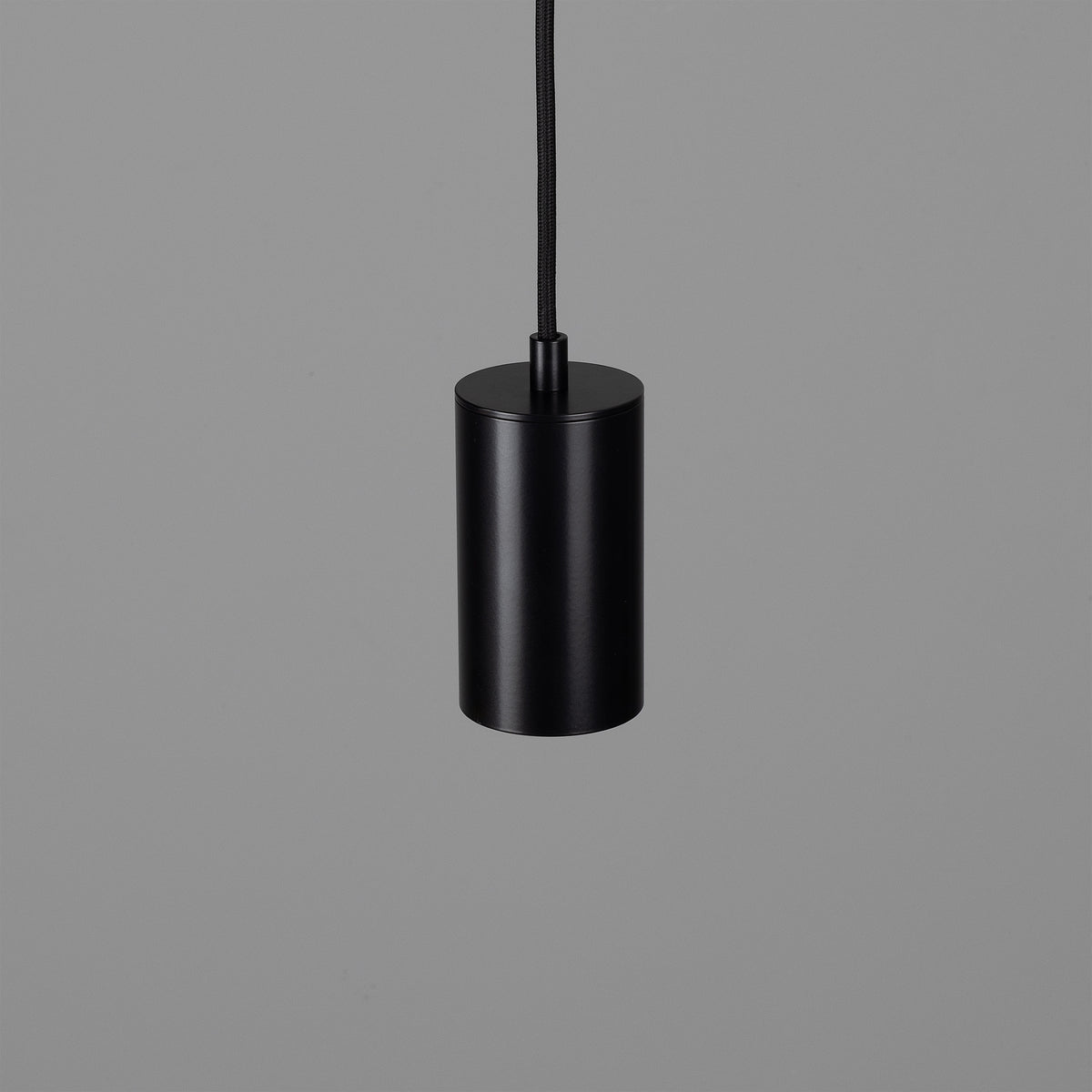 Evanston Single Drop Brass Pendant Spotlight in Matte Black