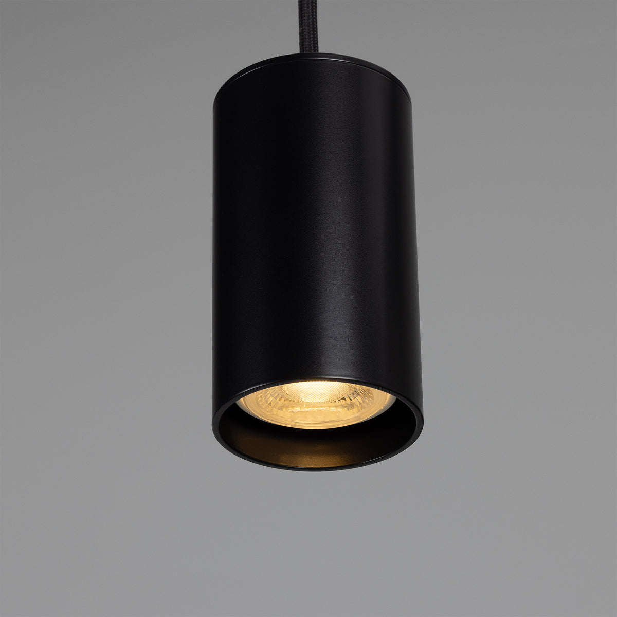 Evanston Single Drop Brass Pendant Spotlight in Matte Black