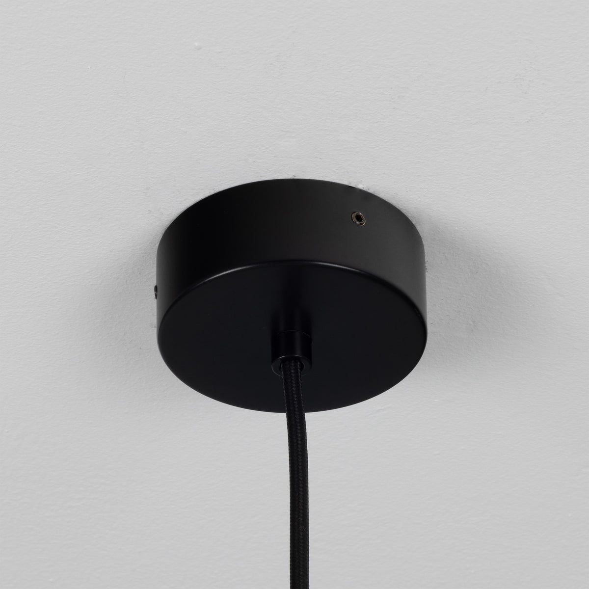 Evanston Single Drop Brass Pendant Spotlight in Matte Black
