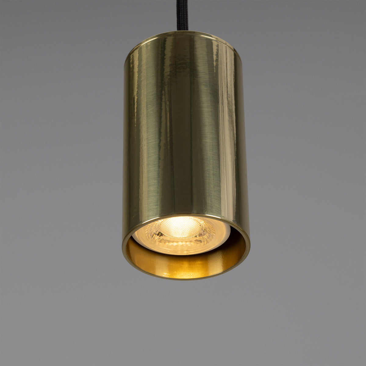Evanston Single Drop Brass Pendant Spotlight in Polished Brass