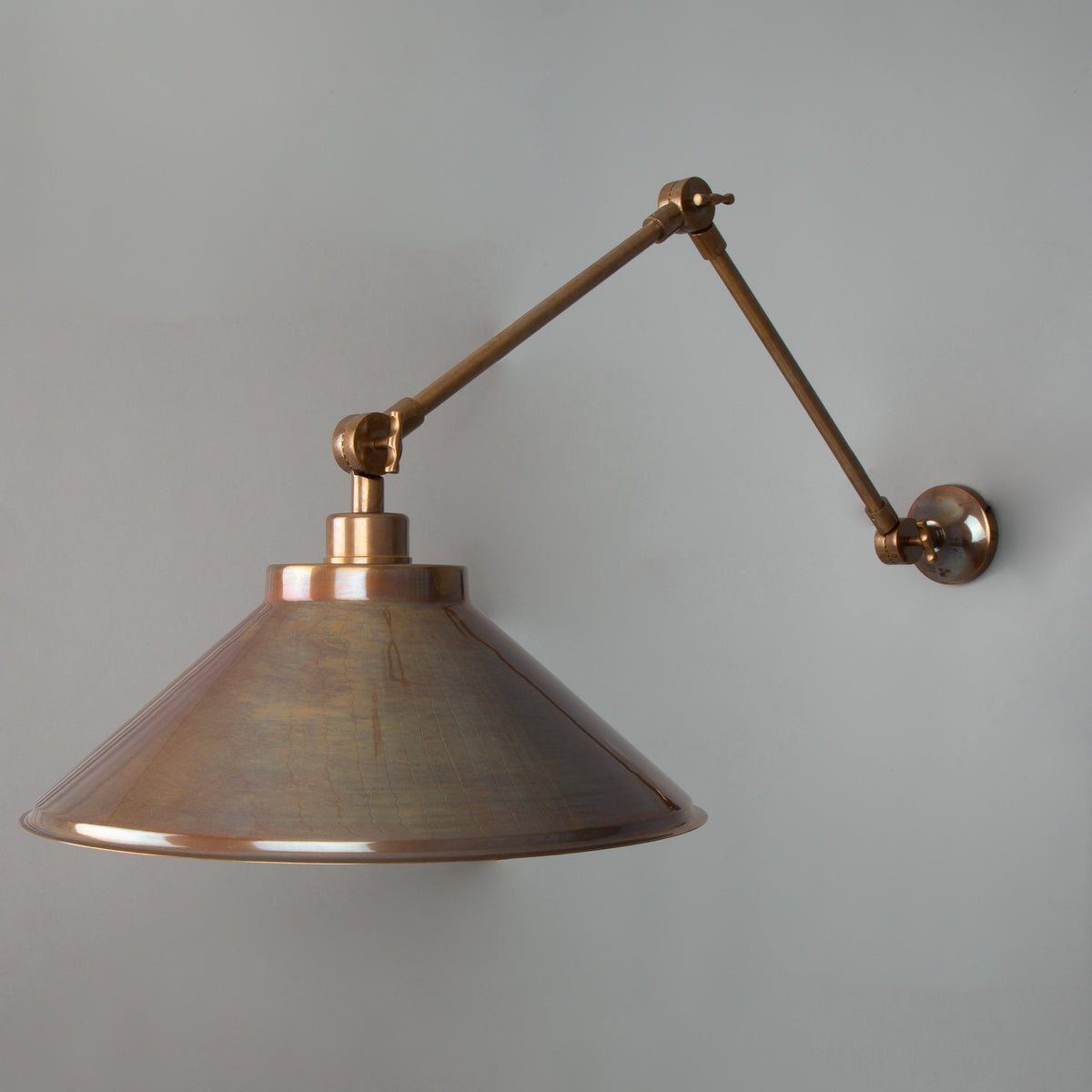 Rio Adjustable Arm Wall Light in Antique Brass