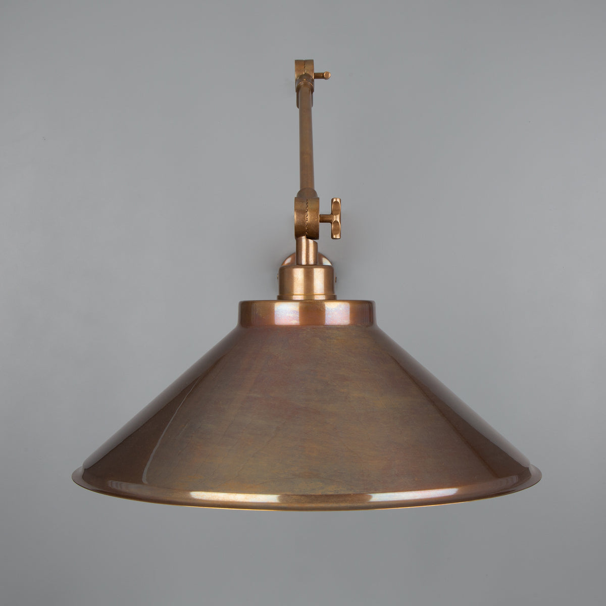 Rio Adjustable Arm Wall Light in Antique Brass