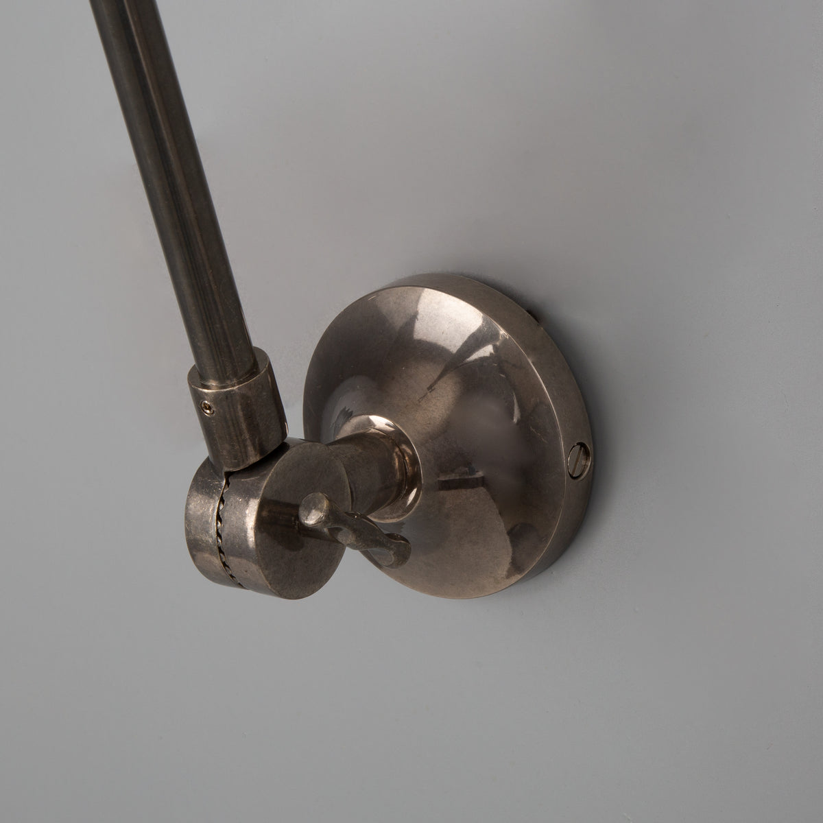 Rio Adjustable Arm Wall Light in Antique Silver
