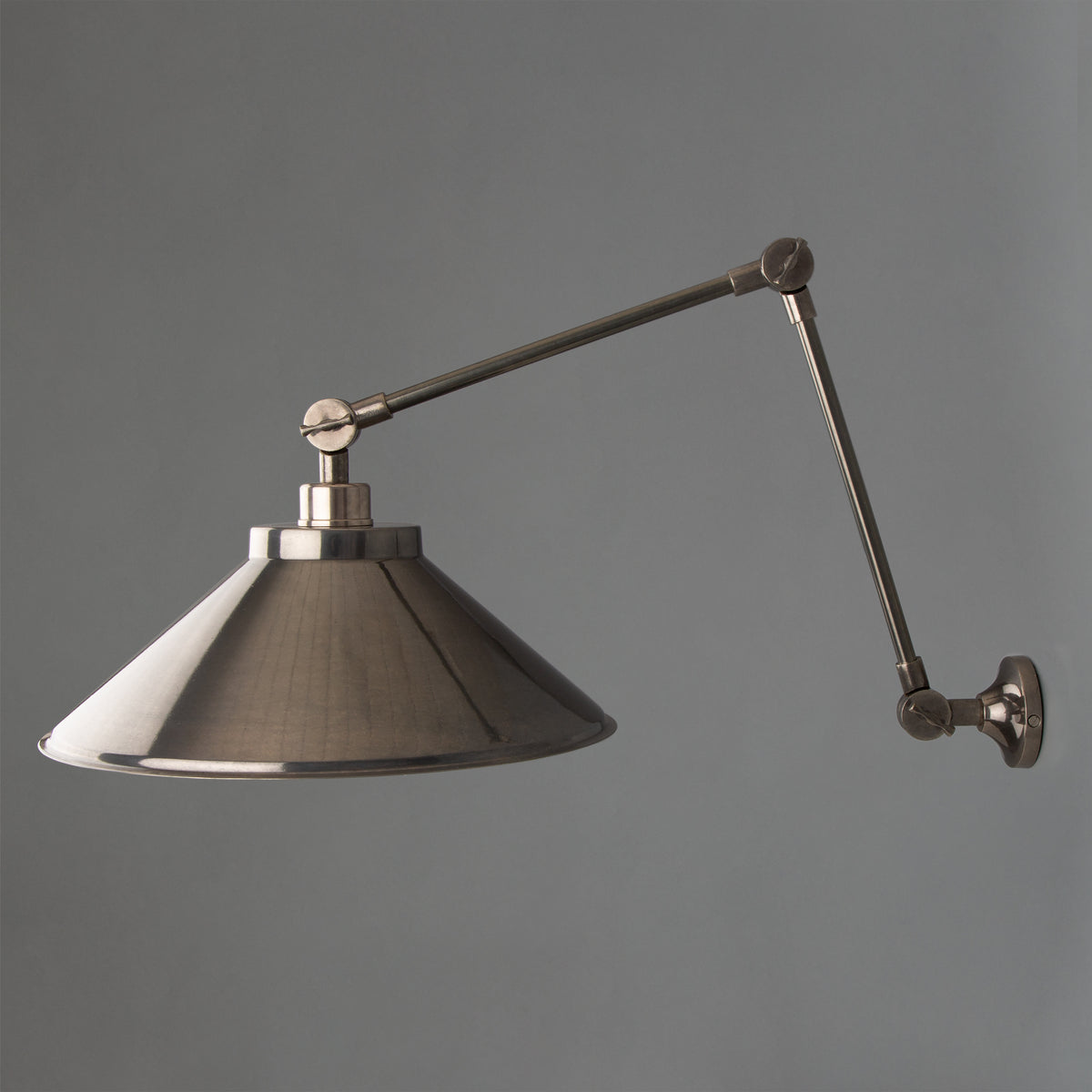 Rio Adjustable Arm Wall Light in Antique Silver
