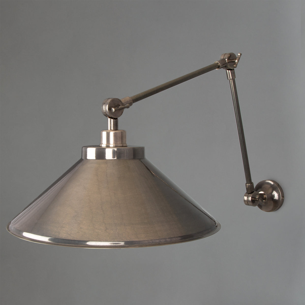 Rio Adjustable Arm Wall Light in Antique Silver