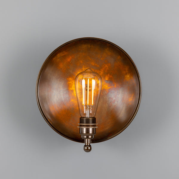 Mullan Chulainn industrial brass dish wall light in antique brass with an exposed filament bulb