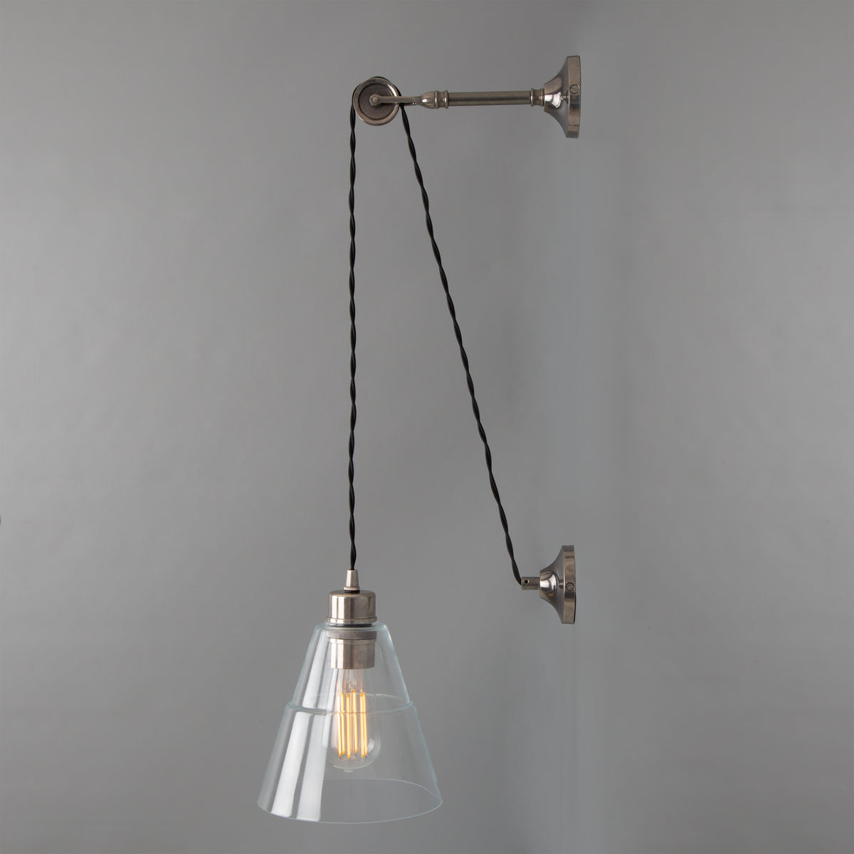 Rigale Industrial Pulley Wall Light in Antique Silver with Clear Glass Shade