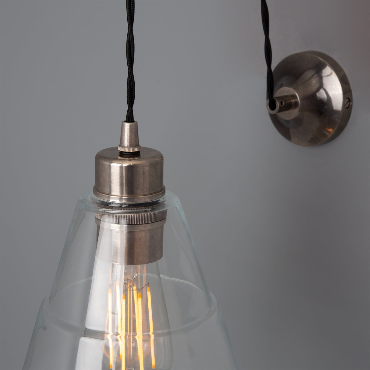 Rigale Industrial Pulley Wall Light in Antique Silver with Clear Glass Shade