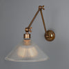 Rebell Adjustable Arm Wall Light in Antique Brass with Prismatic Glass Shade