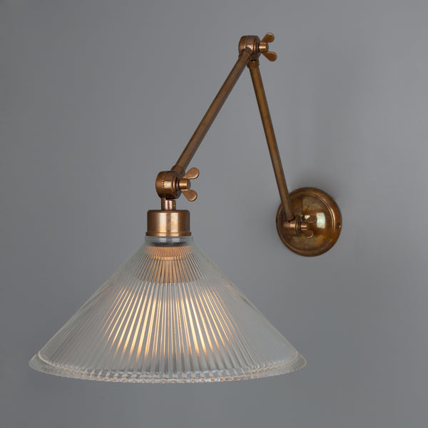 Rebell Adjustable Arm Wall Light in Antique Brass with Prismatic Glass Shade