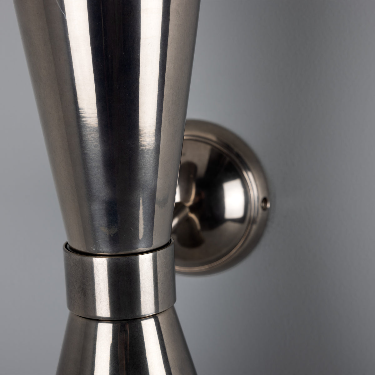 Polished nickel double cone wall sconce