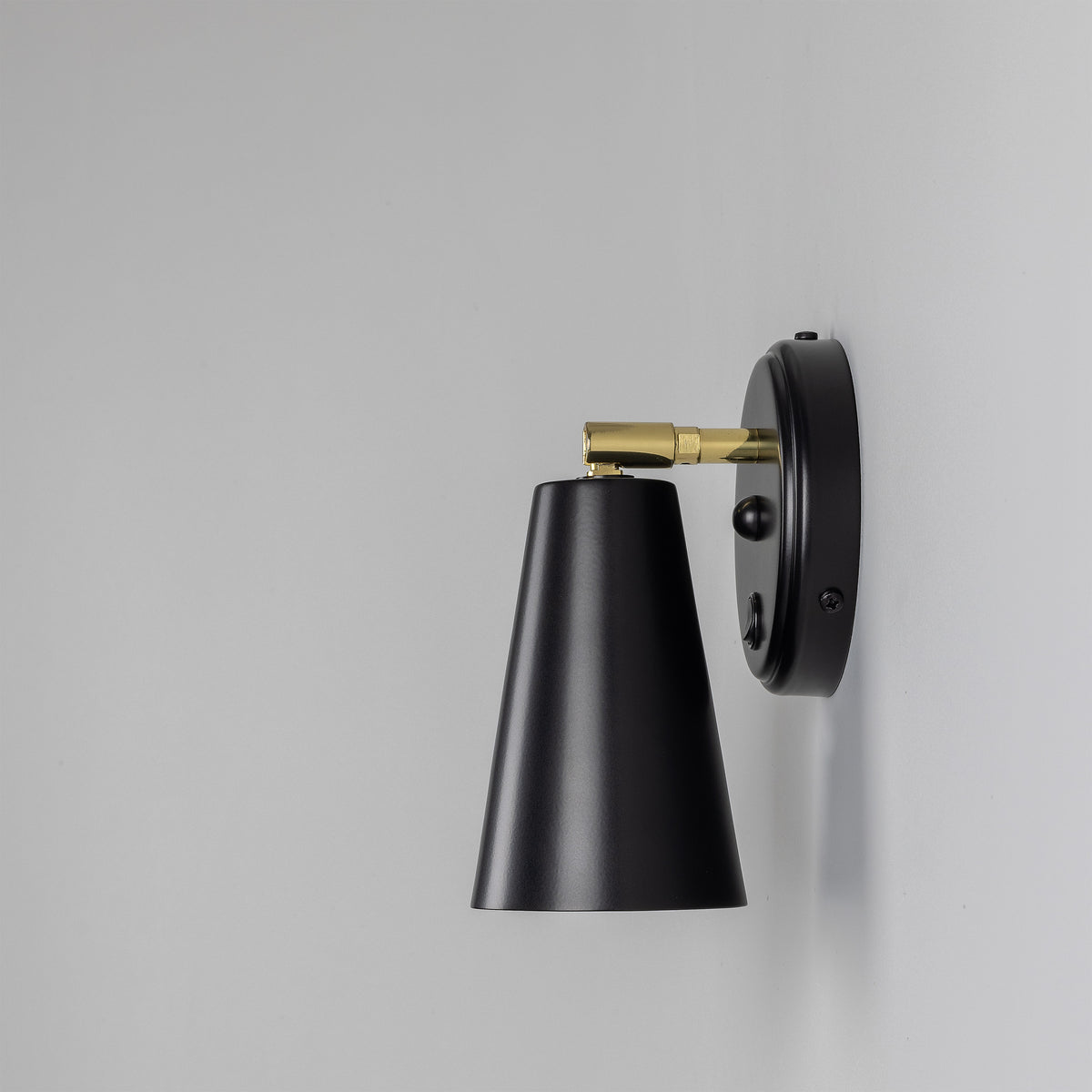Cashel Adjustable Switched Brass Cone Wall Light in Matte Black