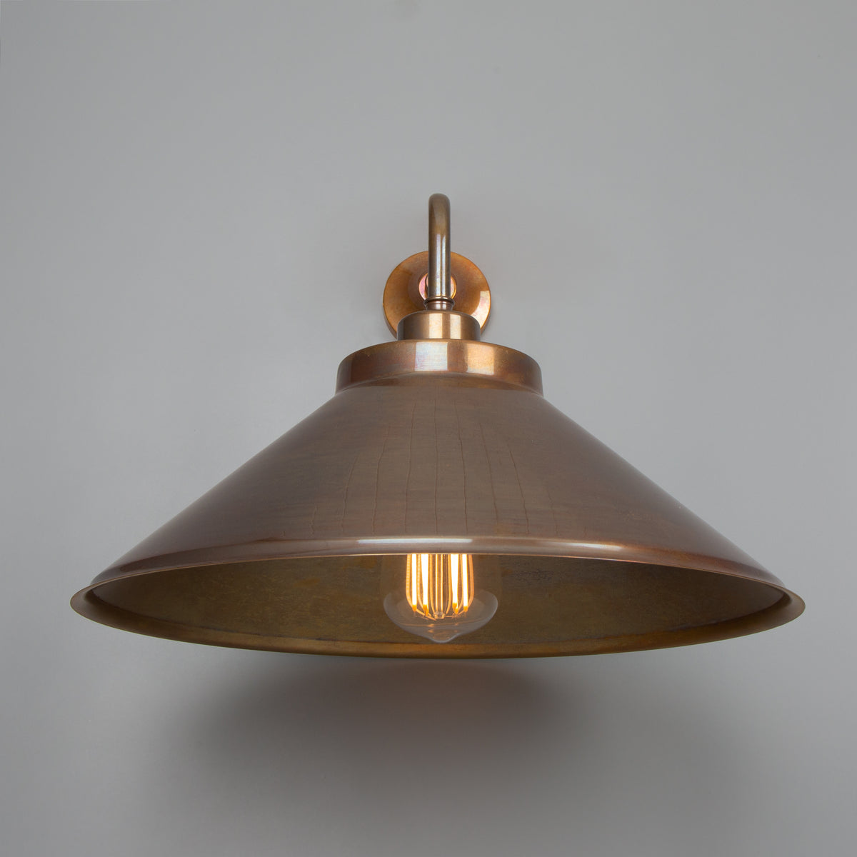 Rio Brass Wall Light with Curved Shade in Antique Brass