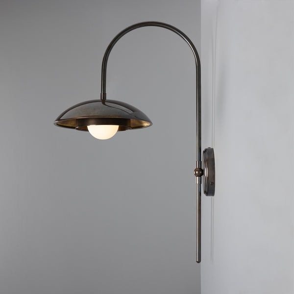 Mullan Marrakesh Art Deco arc wall light in antique brass with a dome shade and round bulb