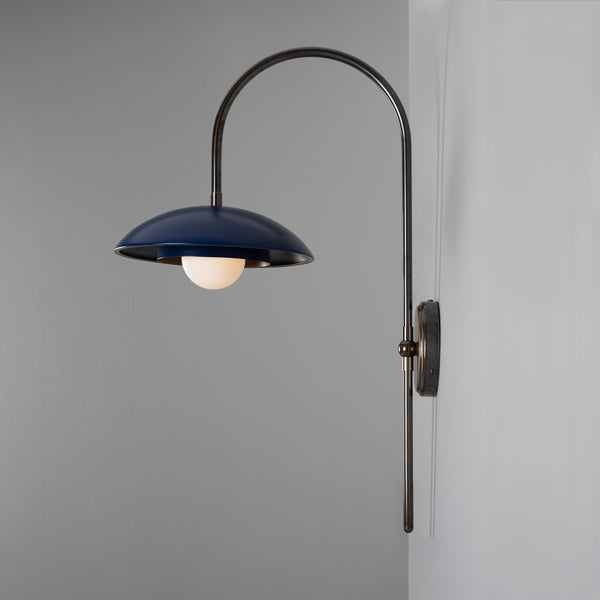 Mullan Marrakesh Art Deco arc wall light in antique brass with a sapphire blue dome shade and round bulb