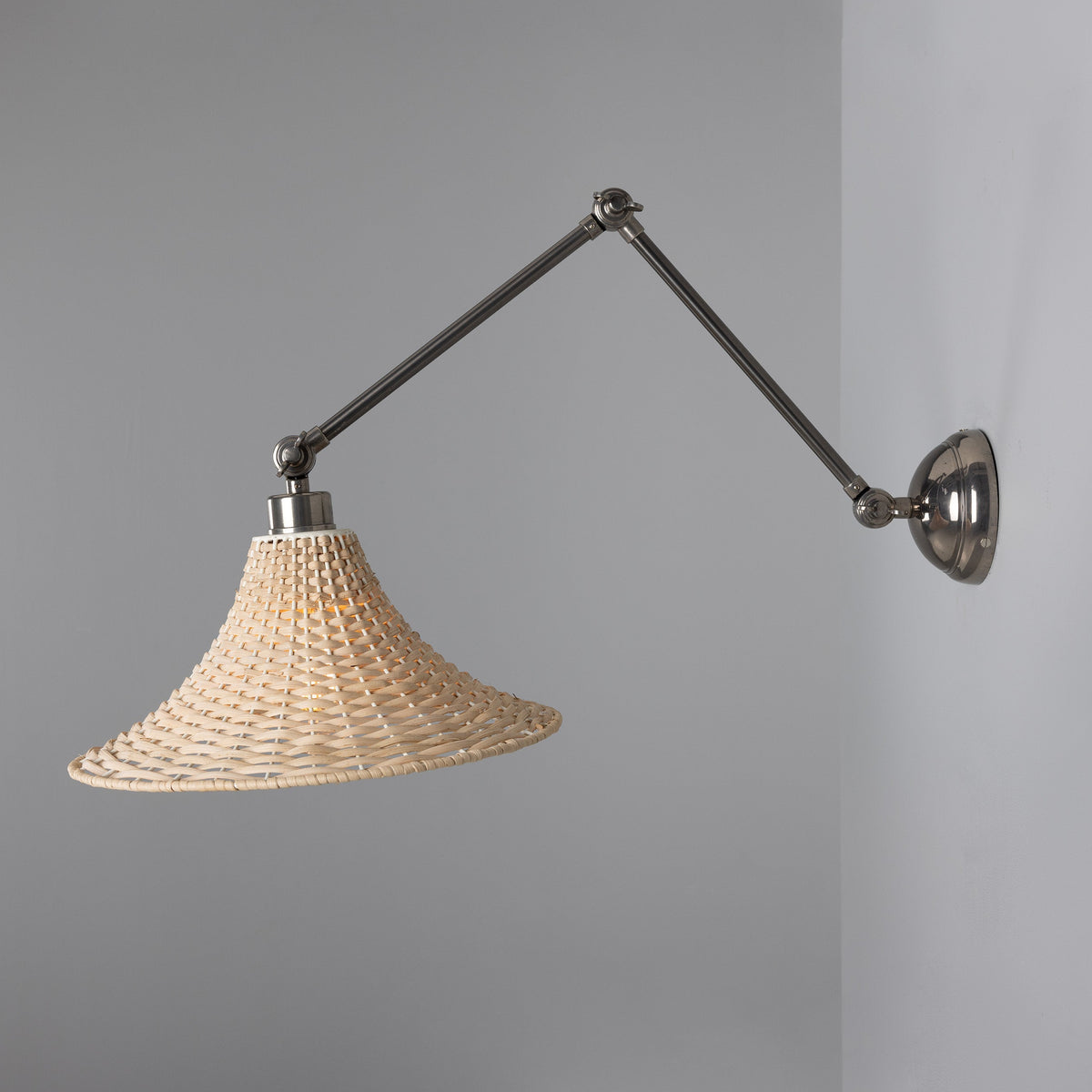 Savannah Adjustable Arm Wall Light in Antique Silver with Large Bell Shaped Rattan Shade