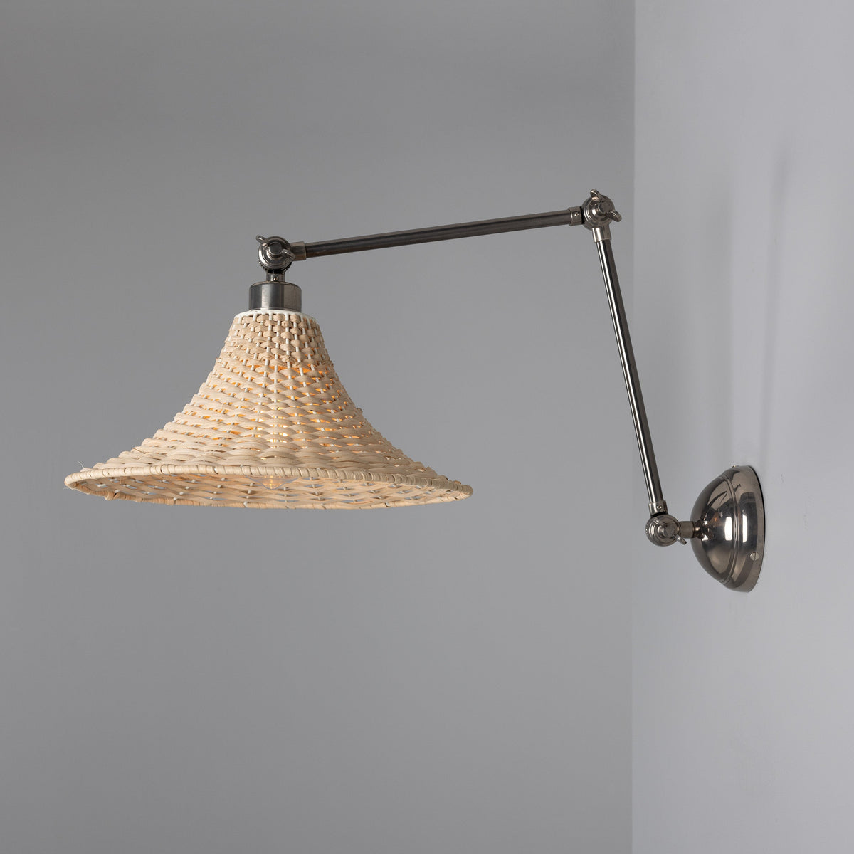 Savannah Adjustable Arm Wall Light in Antique Silver with Large Bell Shaped Rattan Shade