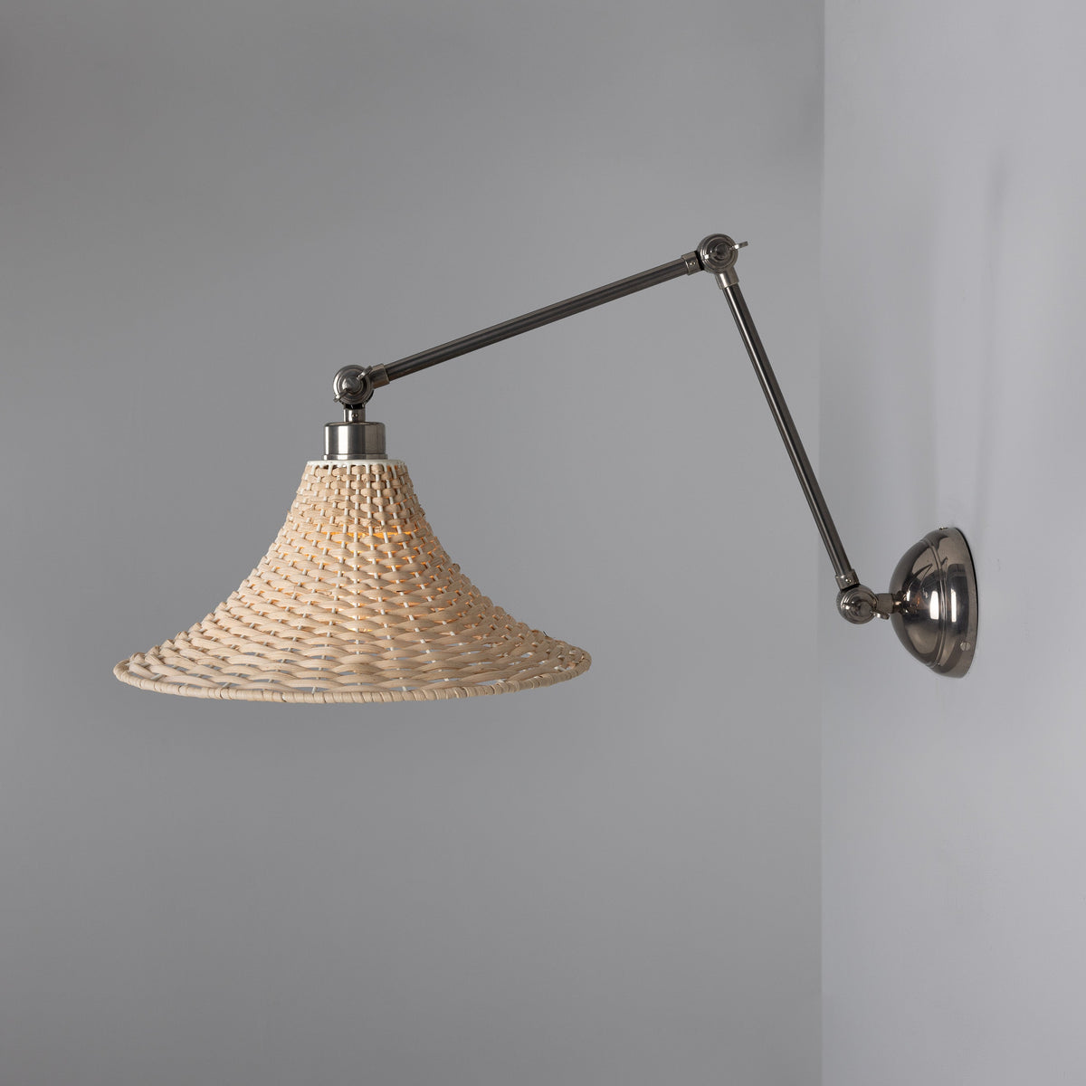 Savannah Adjustable Arm Wall Light in Antique Silver with Large Bell Shaped Rattan Shade