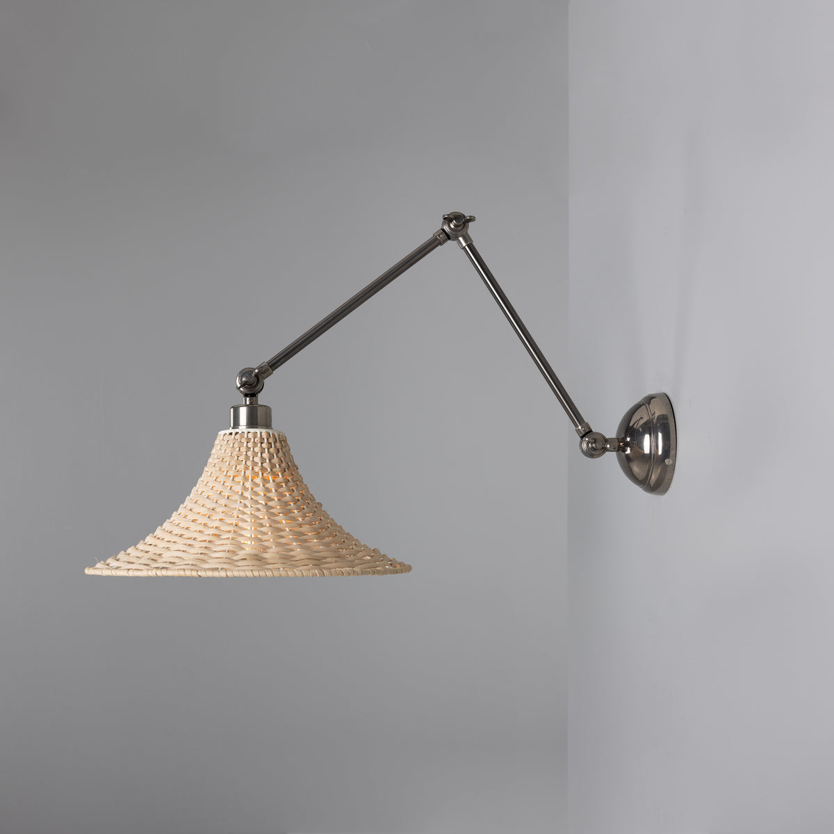 Savannah Adjustable Arm Wall Light in Antique Silver with Large Bell Shaped Rattan Shade