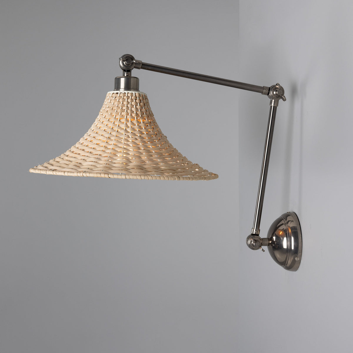 Savannah Adjustable Arm Wall Light in Antique Silver with Large Bell Shaped Rattan Shade