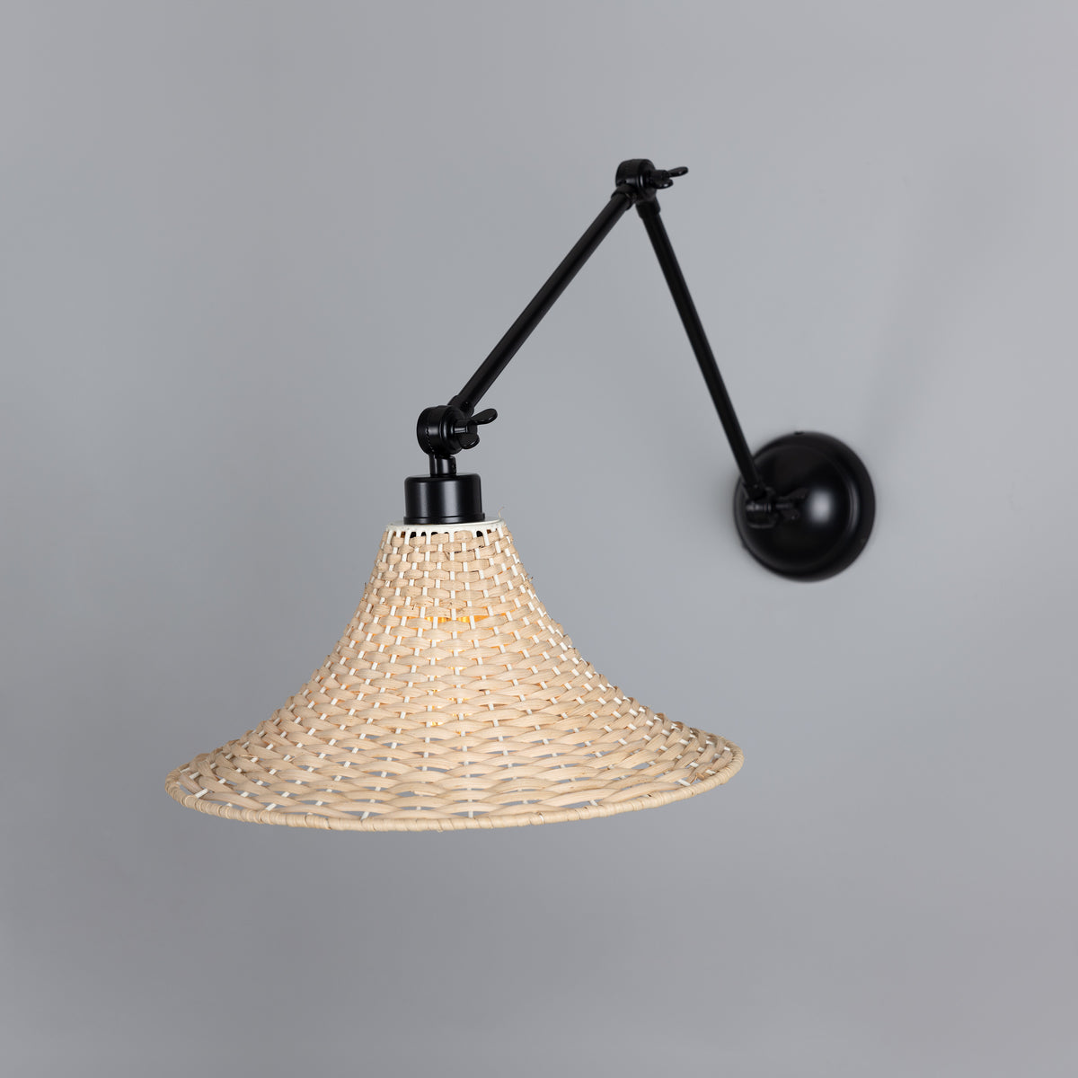 Savannah Adjustable Arm Wall Light in Matte Black with Large Bell Shaped Rattan Shade