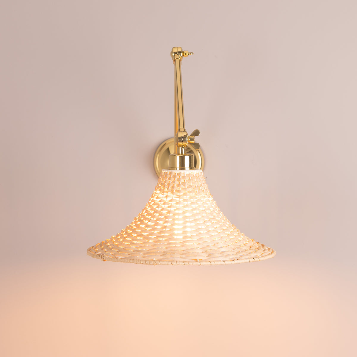 Savannah Adjustable Arm Wall Light in Polished Brass with Large Bell Shaped Rattan Shade