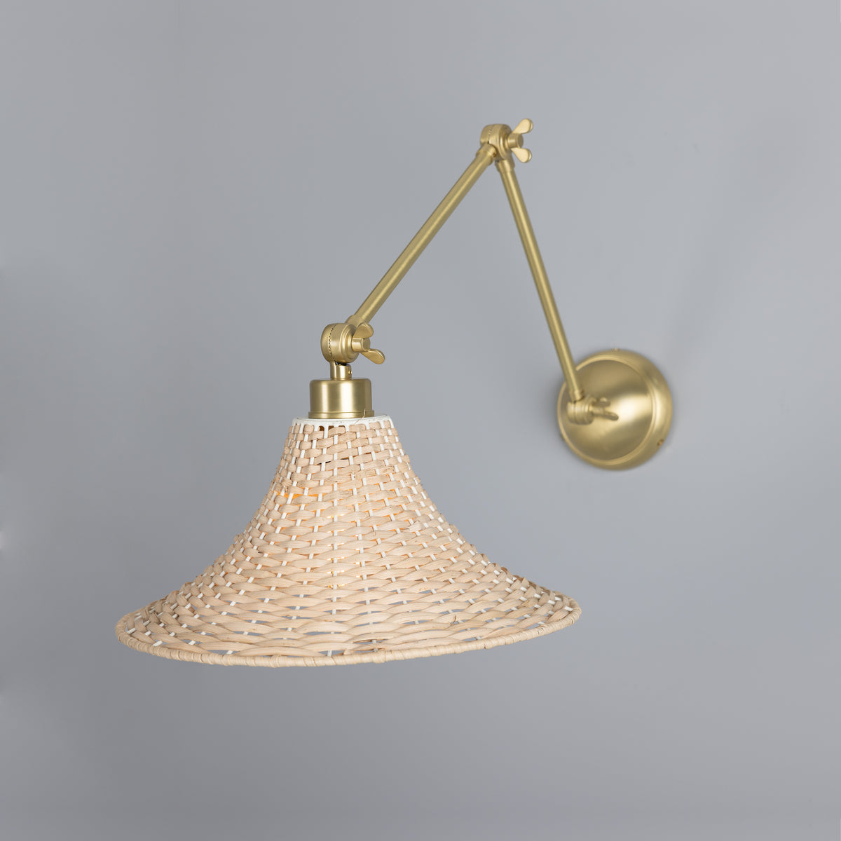 Savannah Adjustable Arm Wall Light in Satin Brass with Large Bell Shaped Rattan Shade