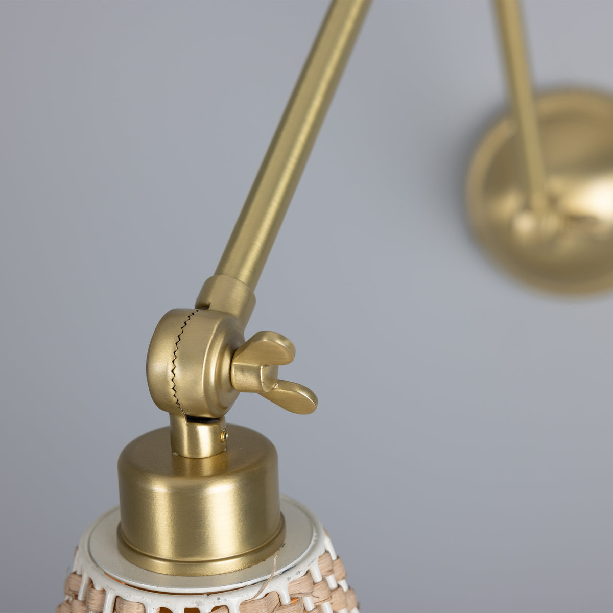 Savannah Adjustable Arm Wall Light in Satin Brass with Large Bell Shaped Rattan Shade