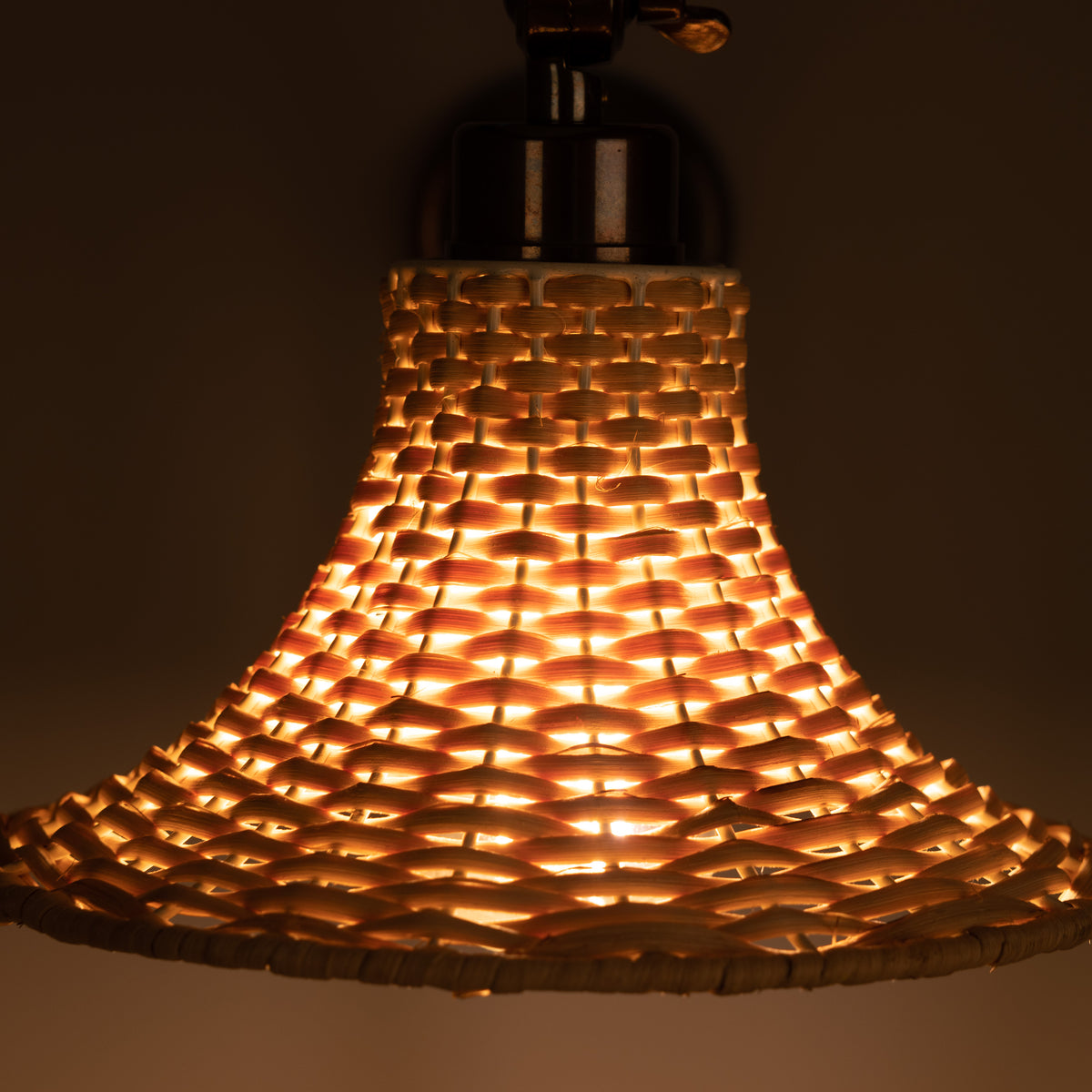 Savannah Adjustable Arm Wall Light in Antique Brass with Small Bell Shaped Rattan Shade