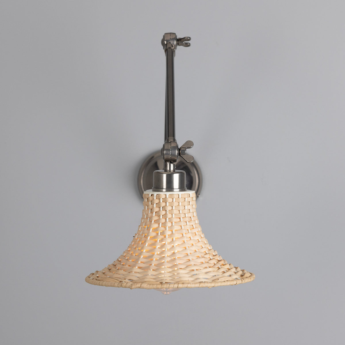Savannah Adjustable Arm Wall Light in Antique Silver with Small Bell Shaped Rattan Shade
