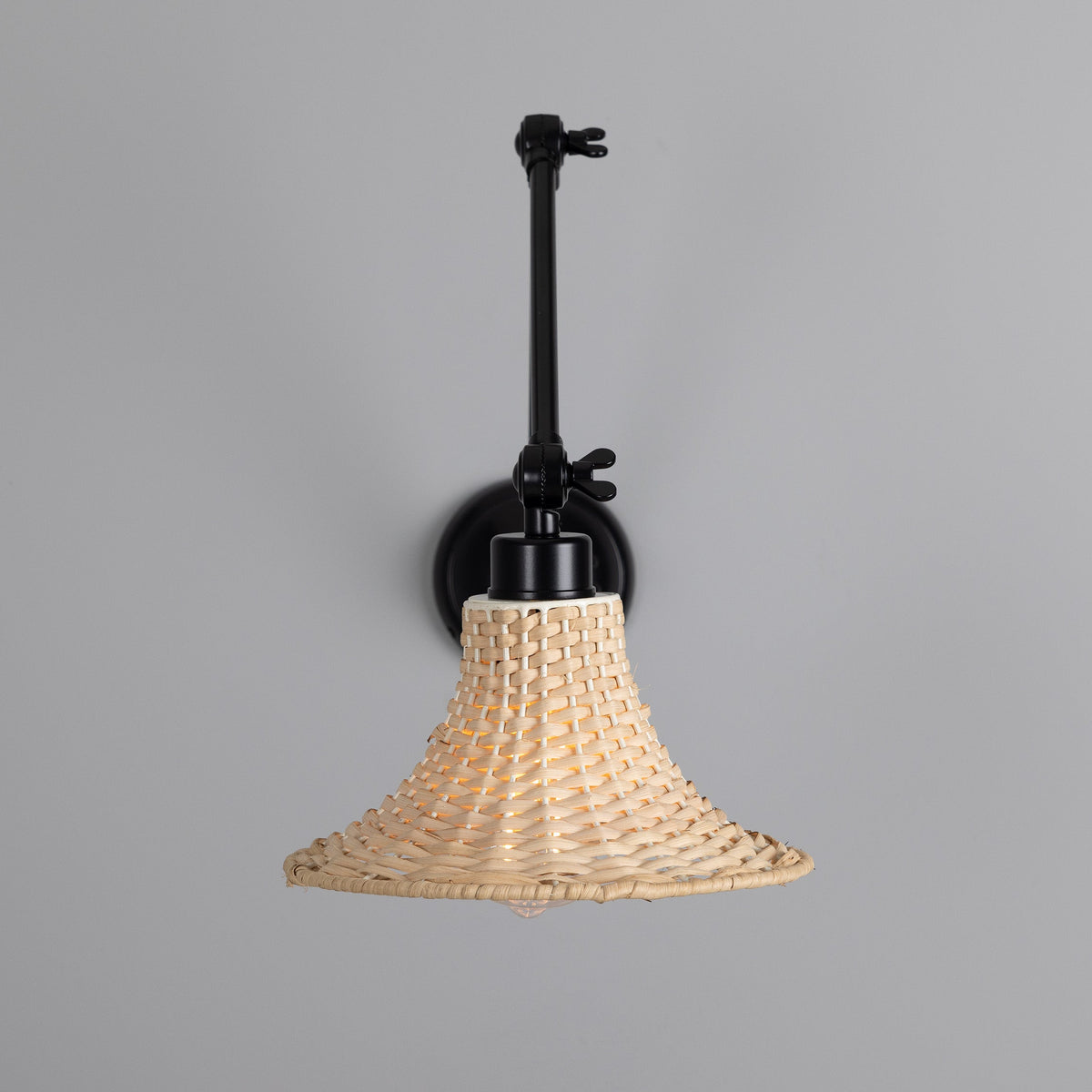 Savannah Adjustable Arm Wall Light in Matte Black with Small Bell Shaped Rattan Shade