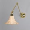 Savannah Adjustable Arm Wall Light in Polished Brass with Small Bell Shaped Rattan Shade