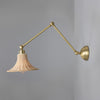Savannah Adjustable Arm Wall Light in Satin Brass with Small Bell Shaped Rattan Shade