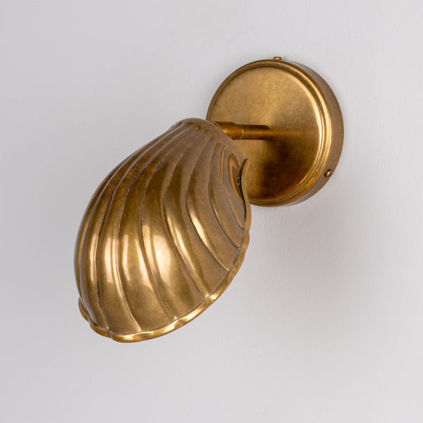 Shell Adjustable Brass Wall Light in Antique Brass