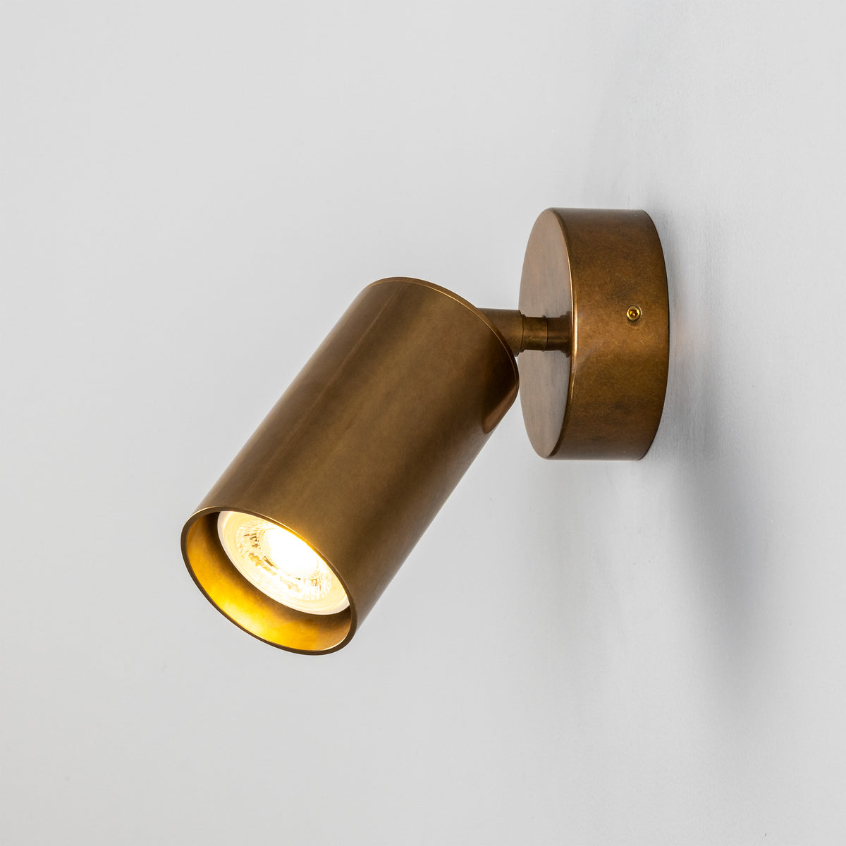 Evanston Directional Brass Wall Spotlight in Antique Brass
