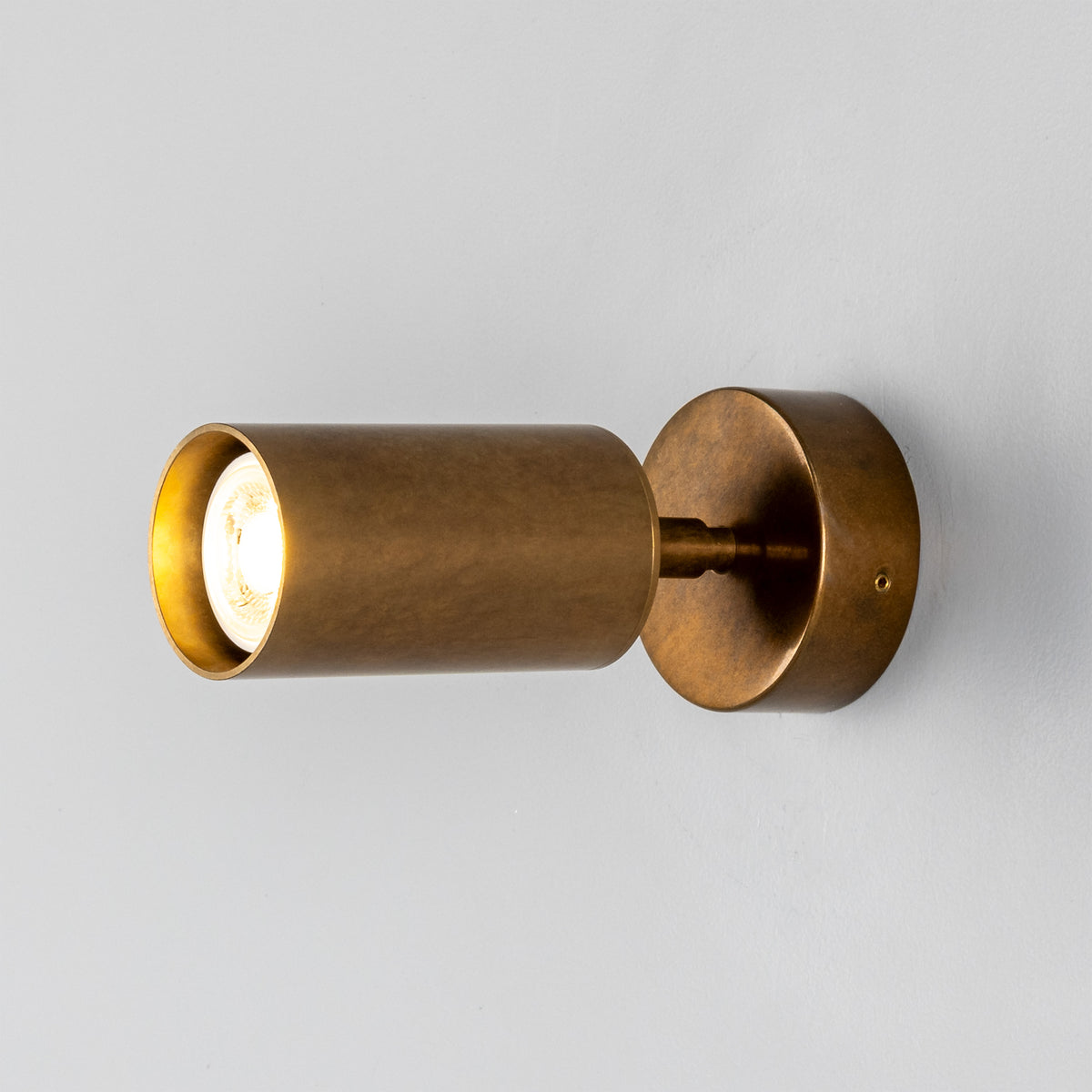 Evanston Directional Brass Wall Spotlight in Antique Brass